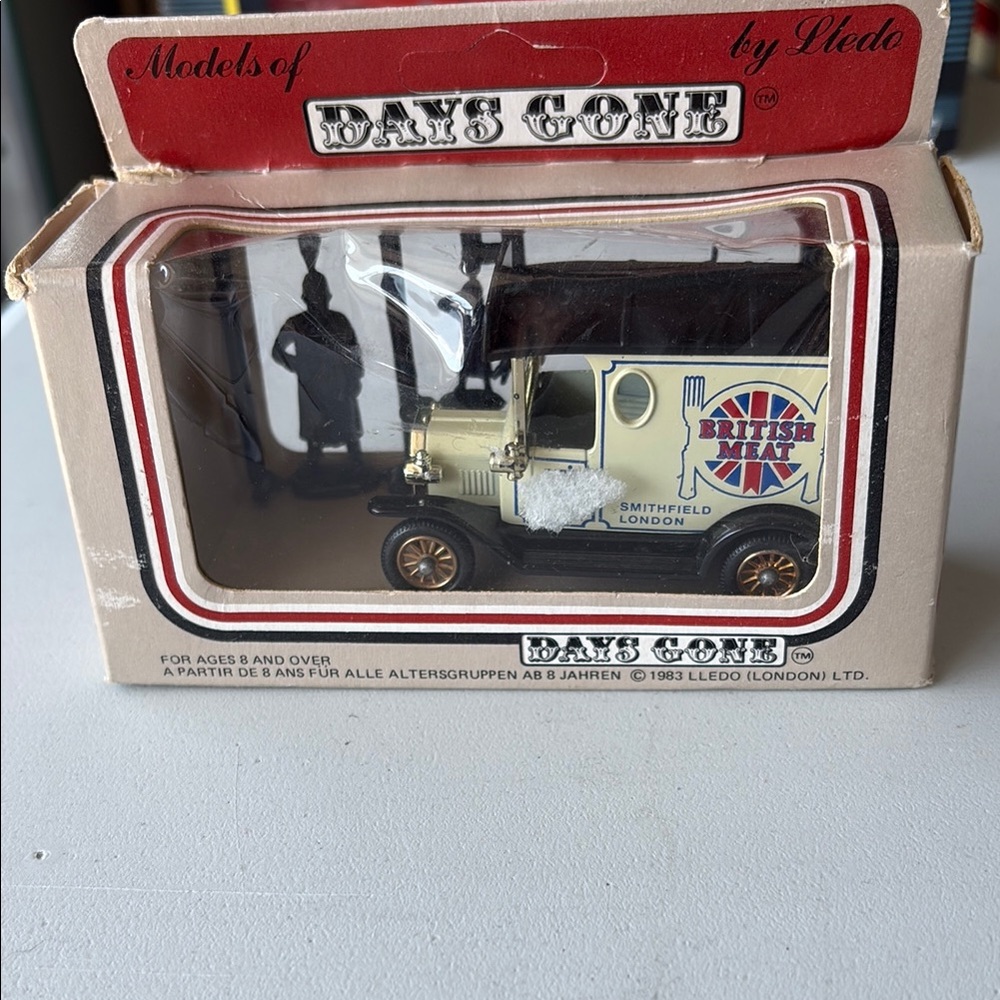 Cream and Black Vintage Model Car